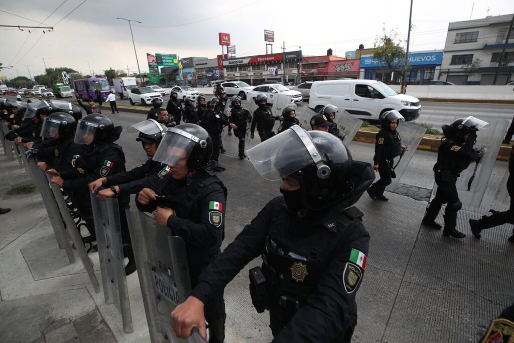 Agente del MP suspendido tras insultar a policía en el estadio Olímpico Universitario